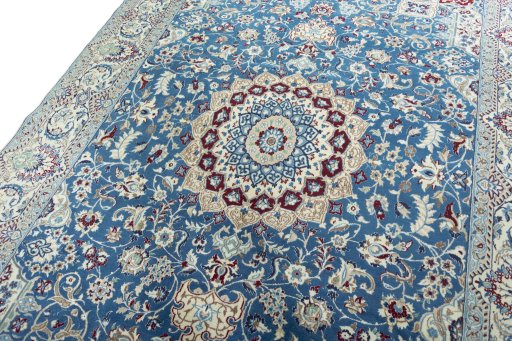 Backside of handmade 2000s Nain rug showing knot structure and weave density
