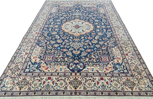Surface texture of 2000s Nain rug with natural Wool and intricate pattern