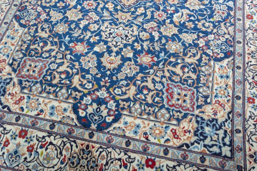 Close-up detail of 2000s Nain rug from Iran / Persia showing Wool weave
