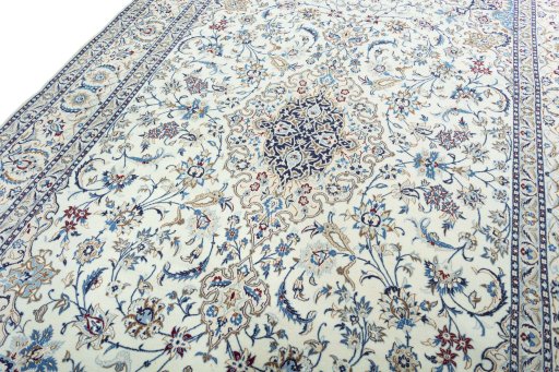 Backside of handmade New Nain rug showing knot structure and weave density