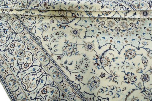 Close-up detail of 2000s Nain rug from Iran / Persia showing Wool weave