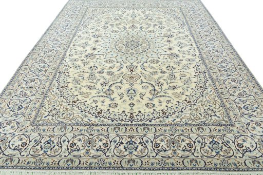 Surface texture of 2000s Nain rug with natural Wool and intricate pattern