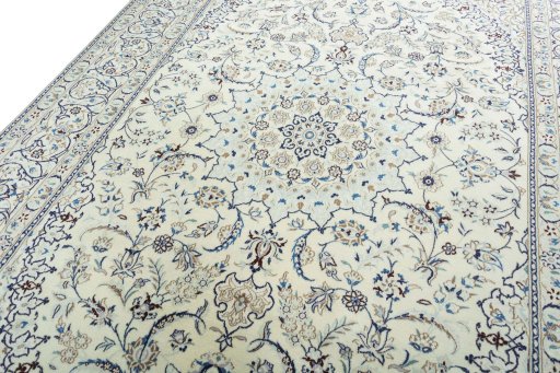 Backside of handmade 2000s Nain rug showing knot structure and weave density
