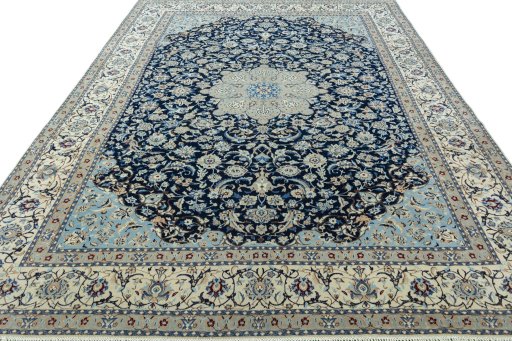Surface texture of 2000s Nain rug with natural Wool and intricate pattern
