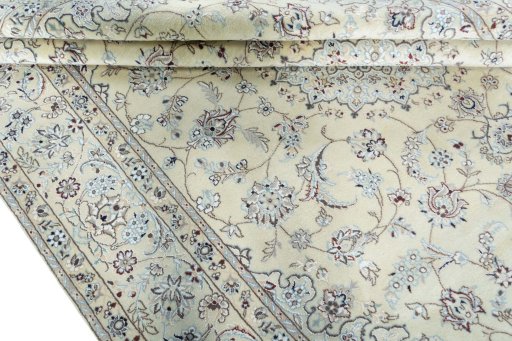 Close-up detail of 2000s Nain rug from Iran / Persia showing Wool weave