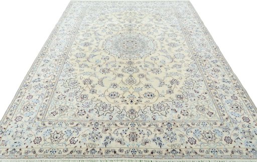 Surface texture of 2000s Nain rug with natural Wool and intricate pattern