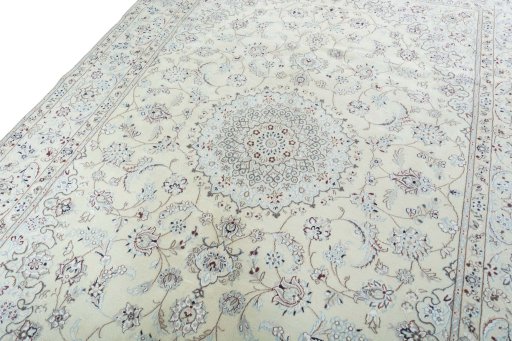 Backside of handmade 2000s Nain rug showing knot structure and weave density