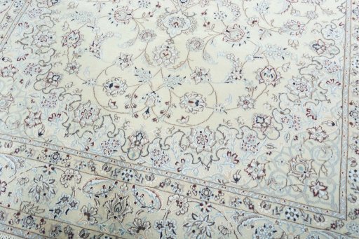 Close-up detail of 2000s Nain rug from Iran / Persia showing Wool weave