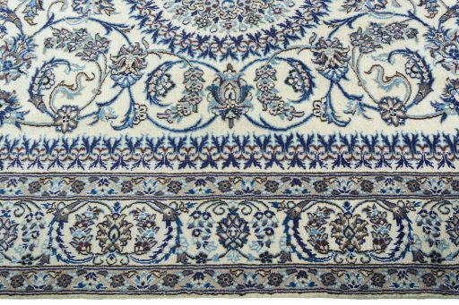 Corner detail of New Nain rug showing border pattern and Wool pile
