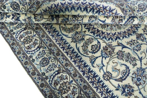 Close-up detail of New Nain rug from Iran / Persia showing Wool weave