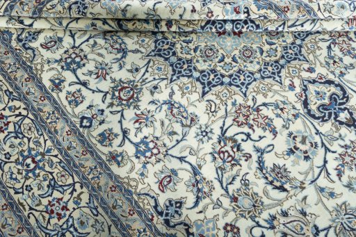 Close-up detail of 2000s Nain rug from Iran / Persia showing Wool weave