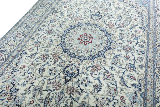 Backside of handmade 2000s Nain rug showing knot structure and weave density
