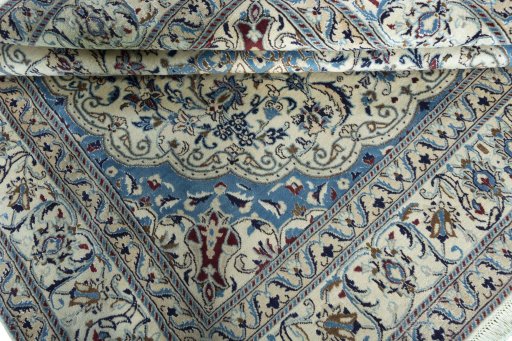 Close-up detail of 1970s Nain rug from Iran / Persia showing Wool weave