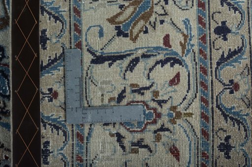 Backside of handmade 1970s Nain rug showing knot structure and weave density