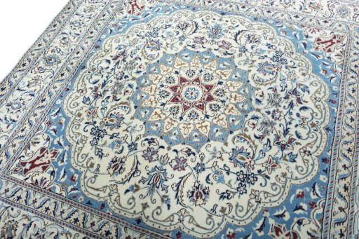 Backside of handmade 1970s Nain rug showing knot structure and weave density