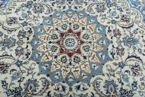 Central medallion detail of 1970s Nain rug from Iran / Persia