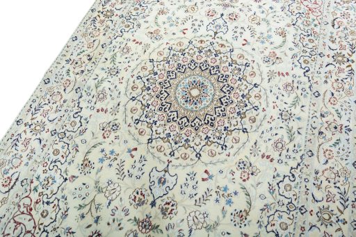 Backside of handmade New Nain rug showing knot structure and weave density
