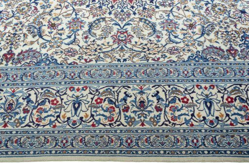 Corner detail of New Nain rug showing border pattern and Wool pile