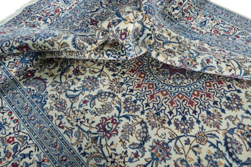 Surface texture of New Nain rug with natural Wool and intricate pattern
