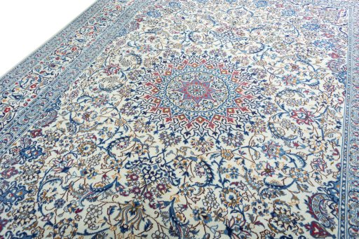 Backside of handmade New Nain rug showing knot structure and weave density