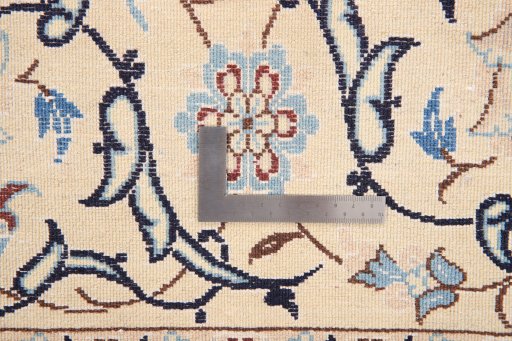 Surface texture of 1990s Nain rug with natural Wool and intricate pattern