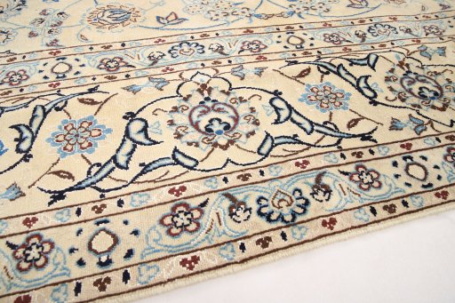 Backside of handmade 1990s Nain rug showing knot structure and weave density