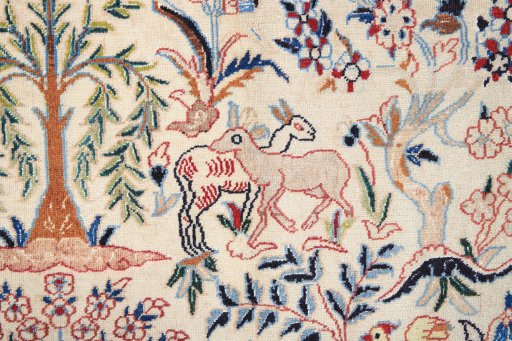 Corner detail of 1980s Nain rug showing border pattern and Wool pile
