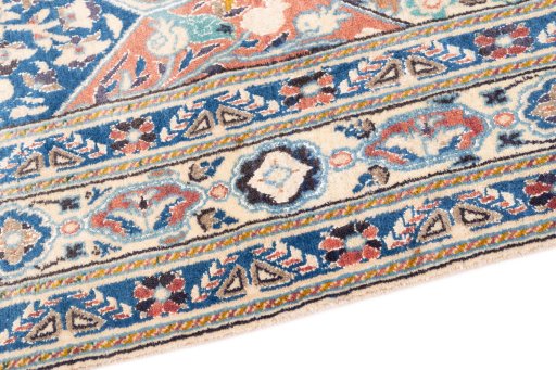 Backside of handmade 2004s Nain rug showing knot structure and weave density