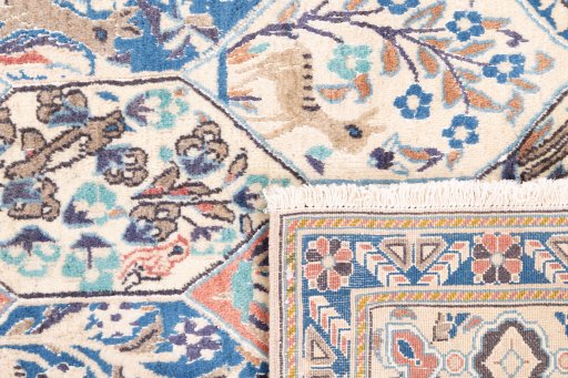 Close-up detail of 2004s Nain rug from Iran / Persia showing Wool weave