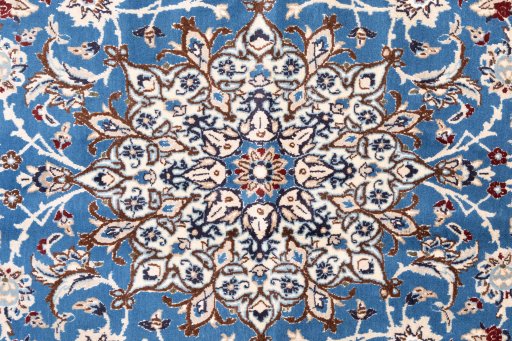 Corner detail of 1985s Nain rug showing border pattern and Wool pile