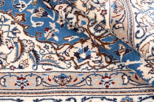 Close-up detail of 1985s Nain rug from Iran / Persia showing Wool weave