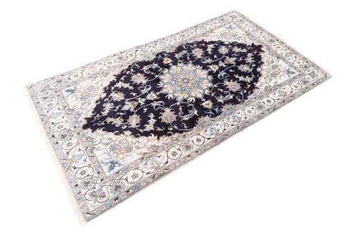Close-up detail of 2005s Nain rug from Iran / Persia showing Wool weave