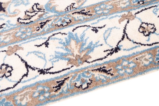 Backside of handmade 2005s Nain rug showing knot structure and weave density