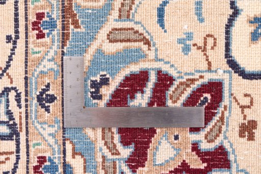 Corner detail of 2005s Nain rug showing border pattern and Wool pile
