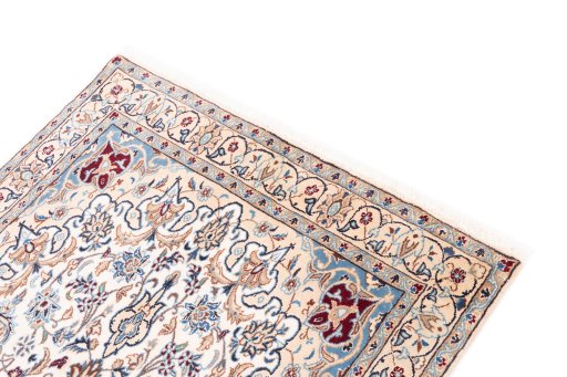 Surface texture of 2005s Nain rug with natural Wool and intricate pattern