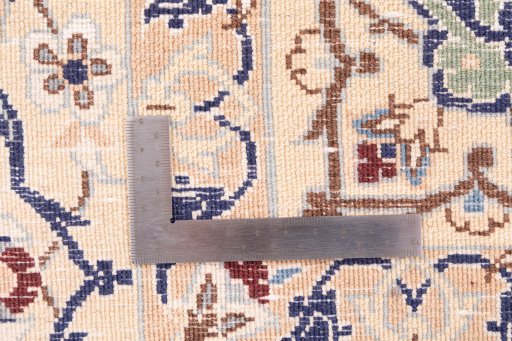 Close-up detail of 1999s Nain rug from Iran / Persia showing Wool weave