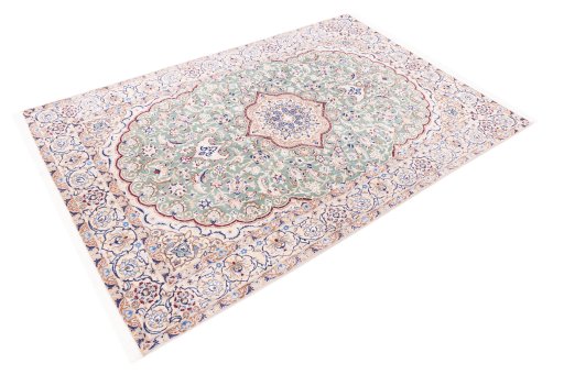 Corner detail of 1999s Nain rug showing border pattern and Wool pile