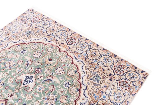 Surface texture of 1999s Nain rug with natural Wool and intricate pattern