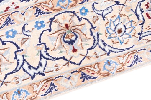 Backside of handmade 1999s Nain rug showing knot structure and weave density