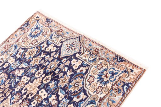 Surface texture of 1988s Nain rug with natural Wool and intricate pattern