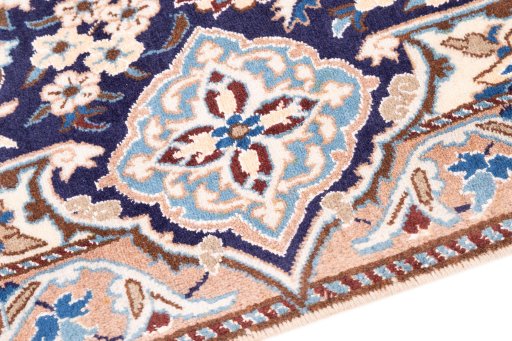 Backside of handmade 1988s Nain rug showing knot structure and weave density