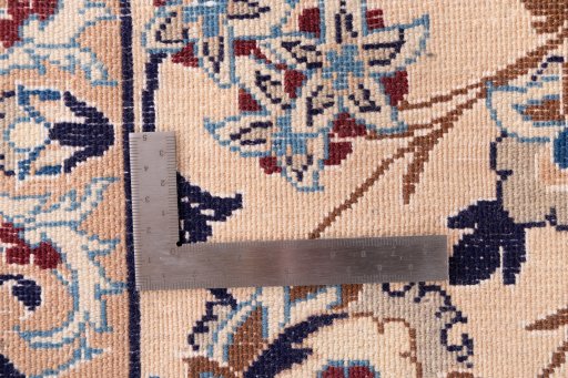 Close-up detail of 1988s Nain rug from Iran / Persia showing Wool weave