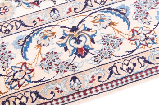 Backside of handmade 1988s Nain rug showing knot structure and weave density