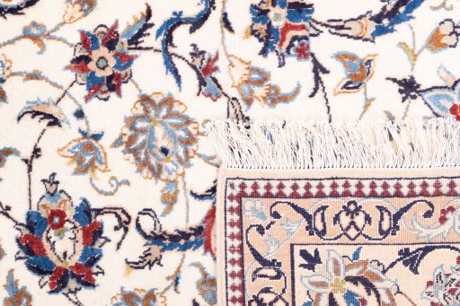 Close-up detail of 1988s Nain rug from Iran / Persia showing Wool weave