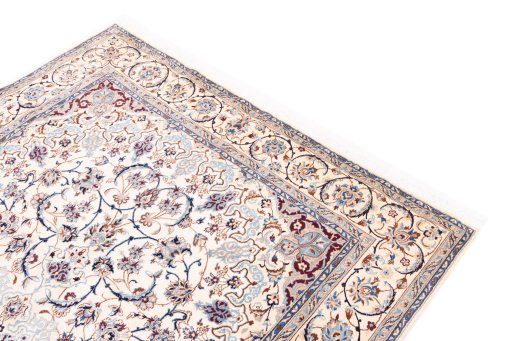 Surface texture of 1987s Nain rug with natural Wool and intricate pattern