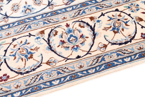 Backside of handmade 1987s Nain rug showing knot structure and weave density