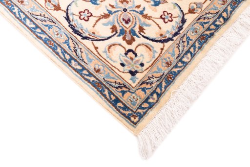 Central medallion detail of 1987s Nain rug from Iran / Persia