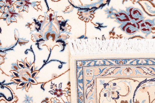 Close-up detail of 1987s Nain rug from Iran / Persia showing Wool weave