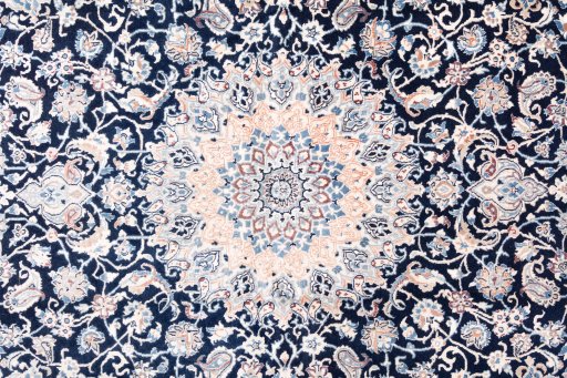 Corner detail of 2005s Nain rug showing border pattern and Wool pile