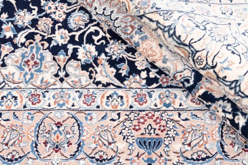 Close-up detail of 2005s Nain rug from Iran / Persia showing Wool weave